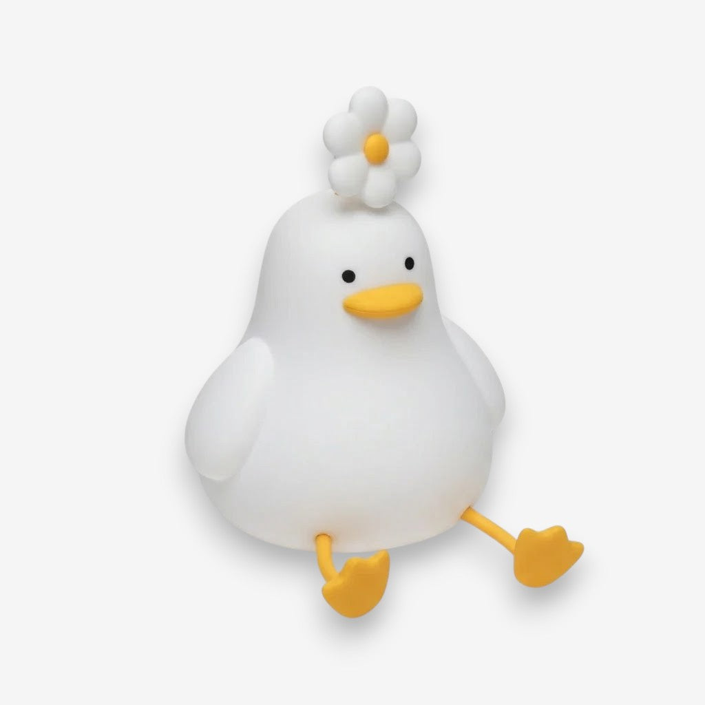 Veilleuse canard avec une fleur
