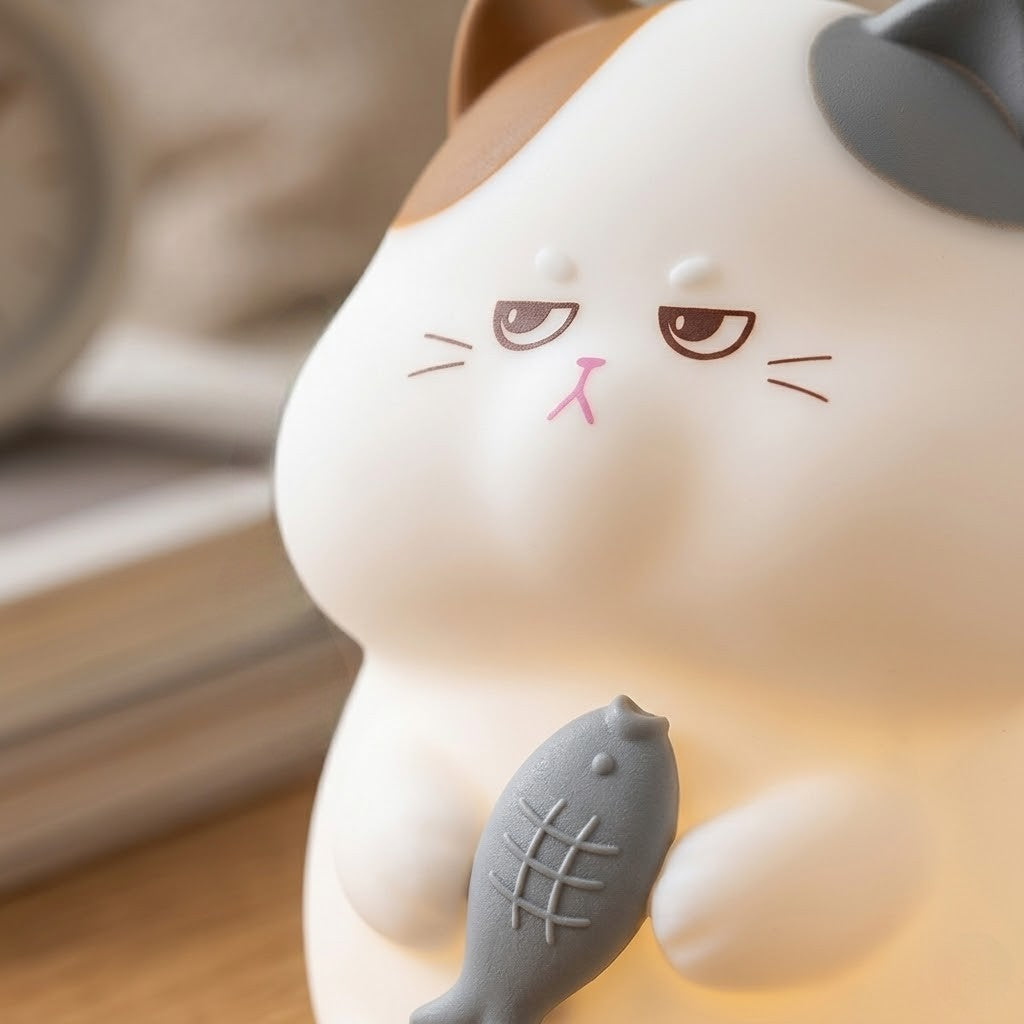 Veilleuse chat qui mange