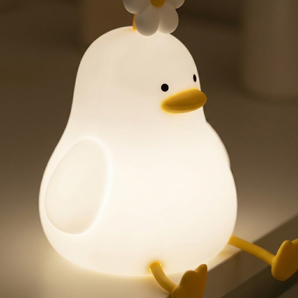 Veilleuse canard avec une fleur