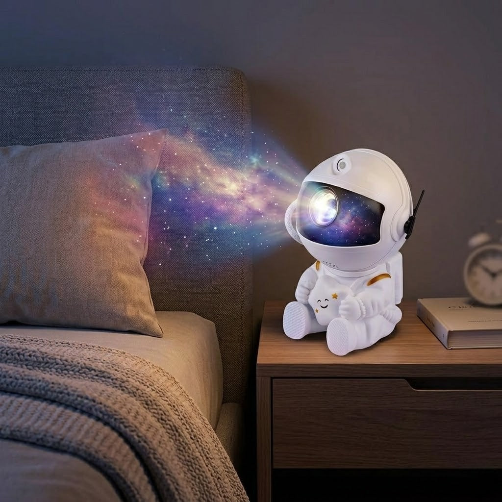 Veilleuse astronaute galaxie assis