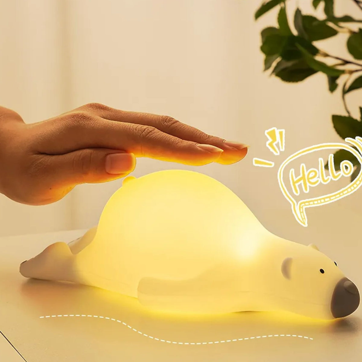 Veilleuse ours allongé sur le ventre