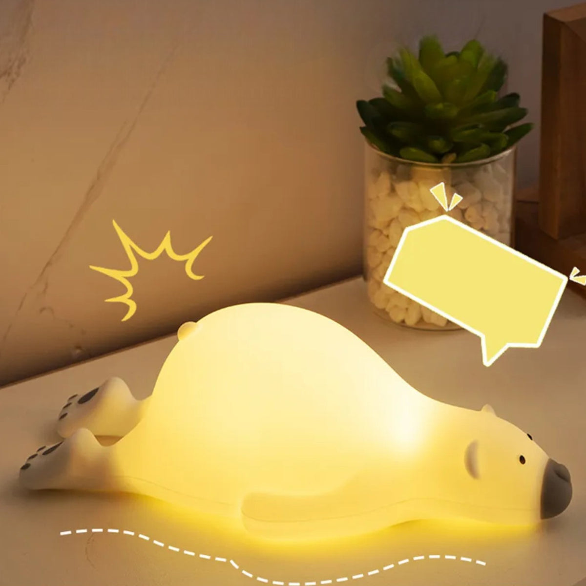 Veilleuse ours allongé sur le ventre