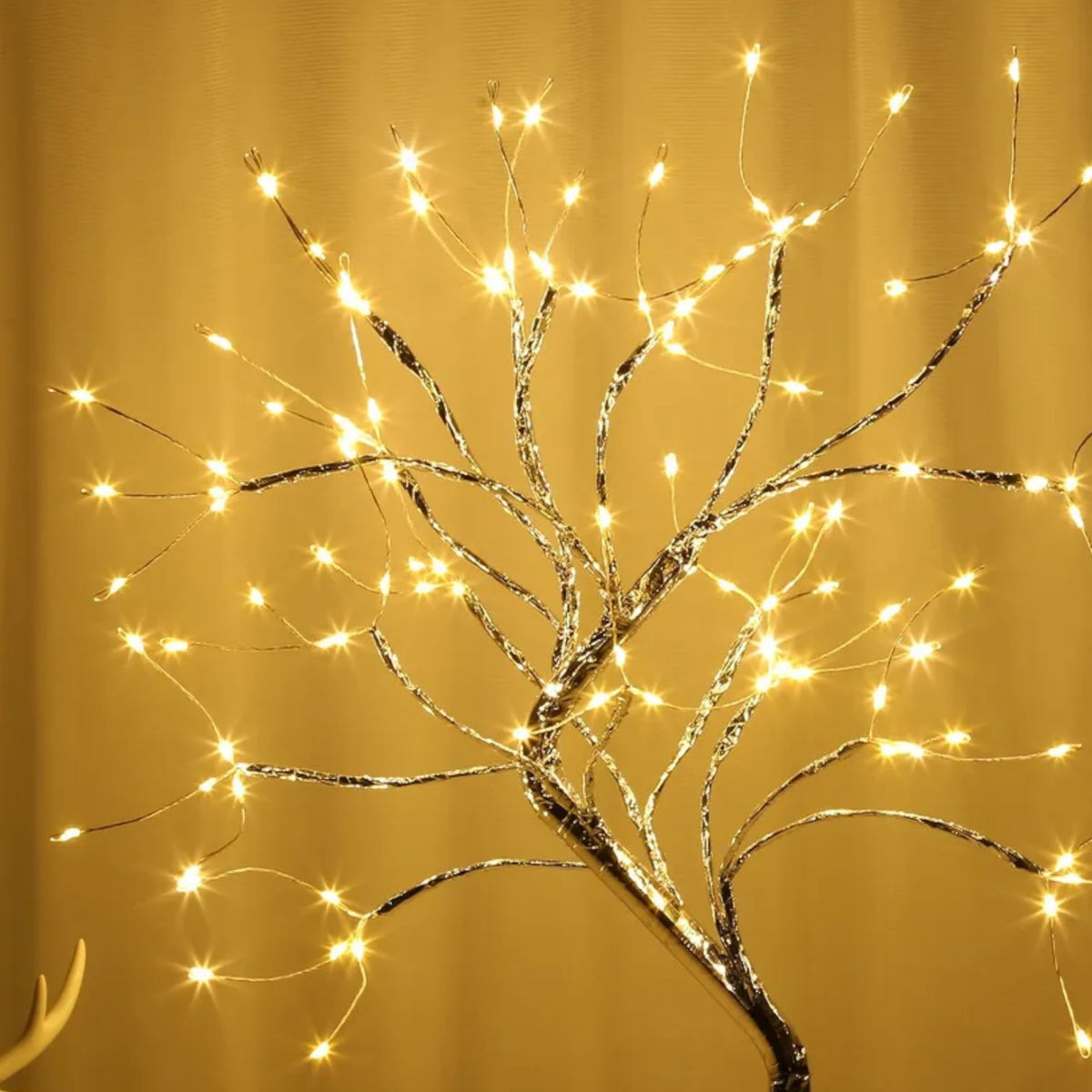 Arbre lumineux branches dorées