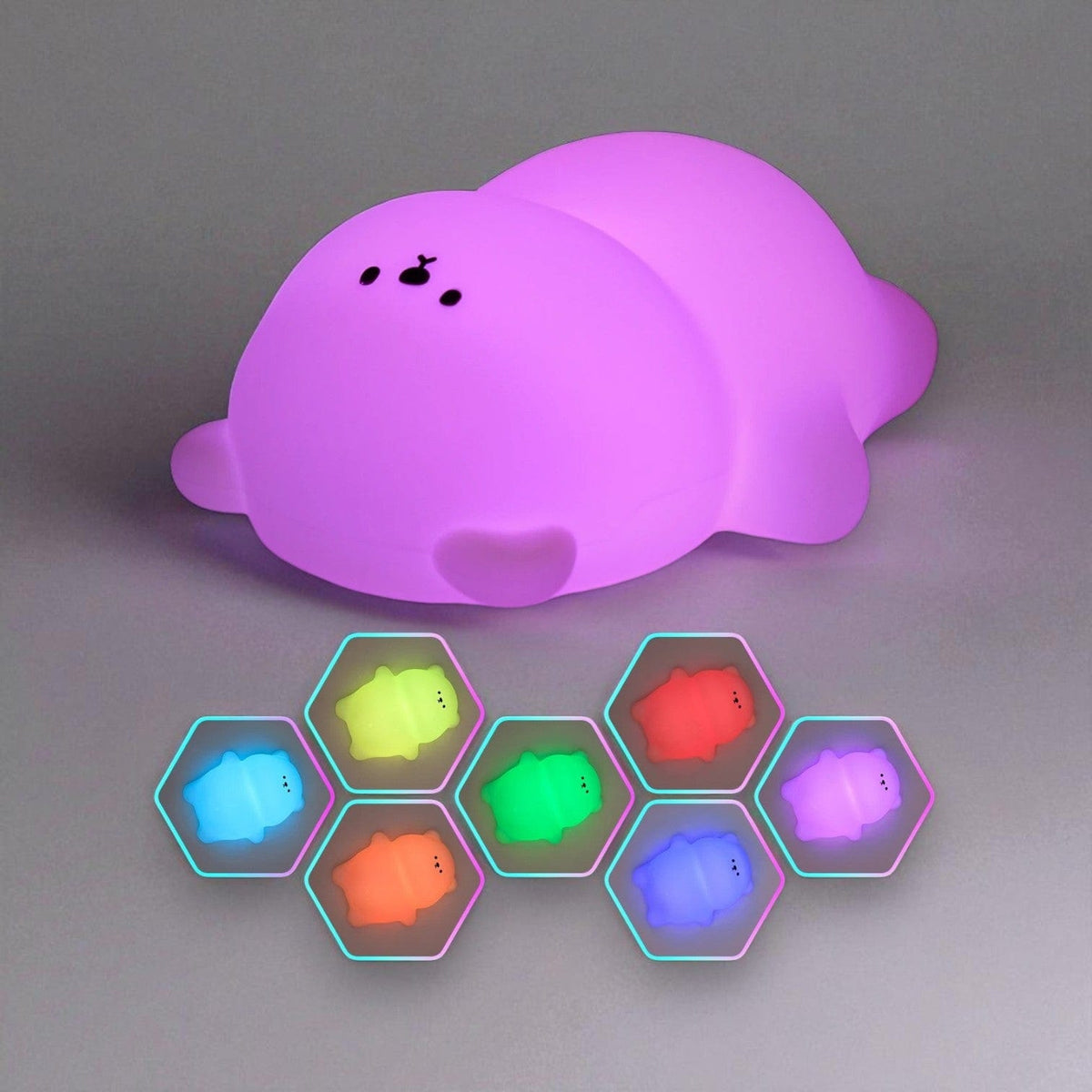 Veilleuse ours allongée sur le dos