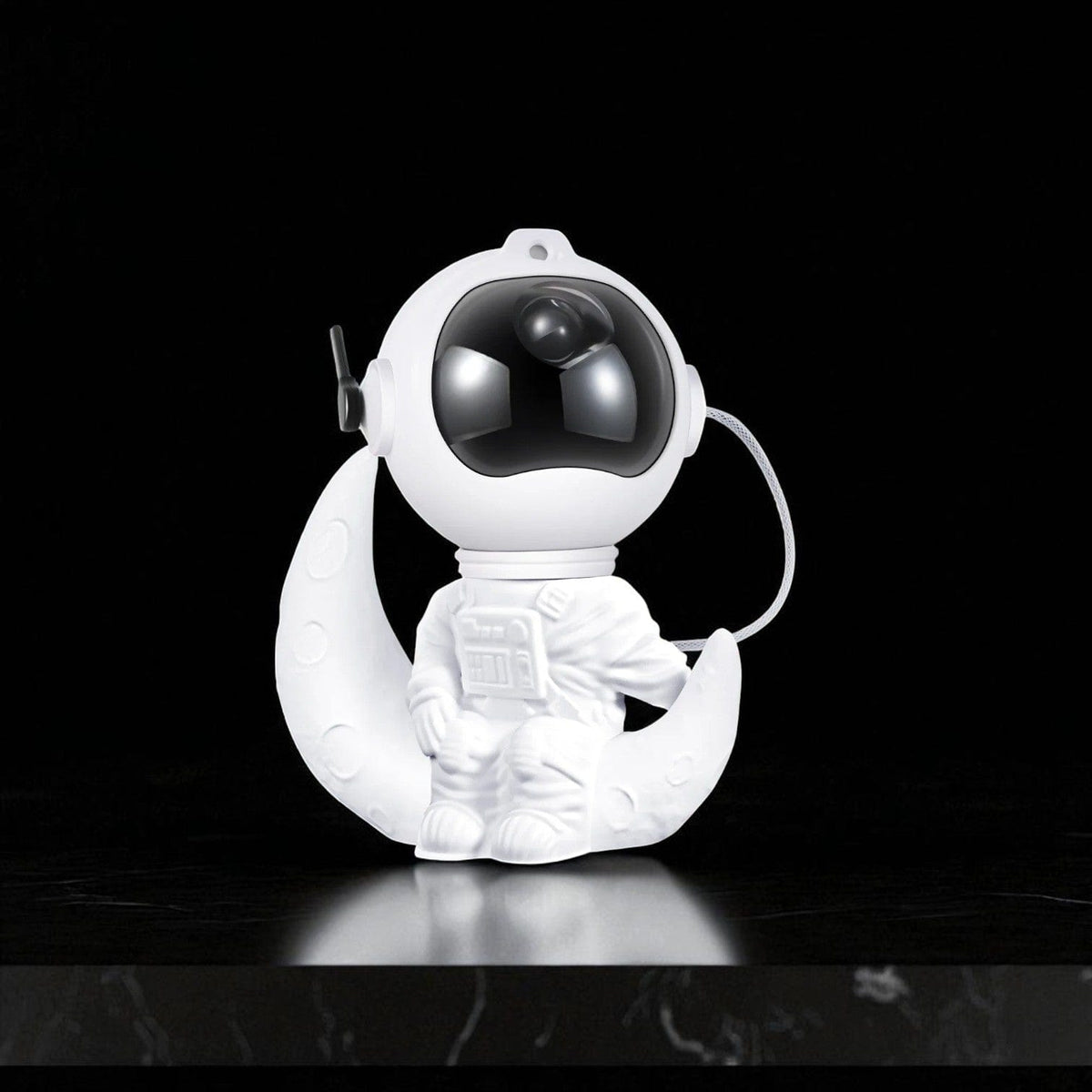 Veilleuse astronaute assis sur la lune