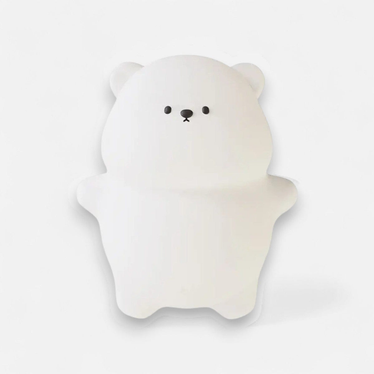 Veilleuse ours allongée sur le dos